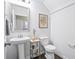 Bright half bathroom with pedestal sink and charming decor at 2324 Town Woods Rd, Charleston, SC 29414