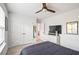 Bedroom featuring neutral carpet, a fan, closet and tv stand at 2324 Town Woods Rd, Charleston, SC 29414