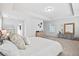 Expansive main bedroom featuring tray ceilings, carpet floors, and neutral decor at 2324 Town Woods Rd, Charleston, SC 29414