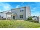 Backyard with new construction home and covered patio, offering a private outdoor space at 239 Parkwood Vista Way, Summerville, SC 29486