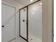 Updated bathroom with glass shower, white subway tile, and bronze shower hardware and accents at 239 Parkwood Vista Way, Summerville, SC 29486
