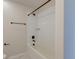 Bathroom featuring a white tiled shower and bronze fixtures at 239 Parkwood Vista Way, Summerville, SC 29486