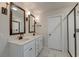 Bathroom features double sinks, granite countertops, stylish mirrors, lighting, and a glass shower at 239 Parkwood Vista Way, Summerville, SC 29486