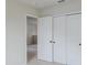 Bright bedroom with neutral carpet with view into the hallway and large closet at 239 Parkwood Vista Way, Summerville, SC 29486
