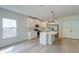 Bright kitchen with white cabinets, stainless appliances, and a central island at 239 Parkwood Vista Way, Summerville, SC 29486
