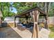 Relaxing gazebo with a comfortable outdoor seating area, perfect for enjoying outdoor activities at 2404 Menola Ave, Charleston, SC 29414