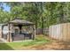 Inviting gazebo with outdoor seating and a landscaped area, great for entertaining or relaxing at 2404 Menola Ave, Charleston, SC 29414