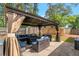 Gazebo with outdoor seating area, ideal for entertaining guests or enjoying the backyard at 2404 Menola Ave, Charleston, SC 29414