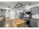 Kitchen features stainless steel appliances, wood countertop island and pendant lighting at 2404 Menola Ave, Charleston, SC 29414