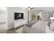 View of main bedroom featuring TV, ceiling fan and en-suite bathroom at 2404 Menola Ave, Charleston, SC 29414