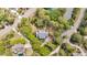 Stunning aerial view of home nestled among mature trees, located on a peaceful street near the water at 2624 Jenkins Point Rd, Seabrook Island, SC 29455