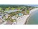 Aerial view of a beach front community featuring multiple pools and beach access at 2624 Jenkins Point Rd, Seabrook Island, SC 29455