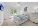 Inviting bedroom with balcony access, carpeted floors, and neutral decor at 2624 Jenkins Point Rd, Seabrook Island, SC 29455