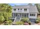 Beautiful two-story home with a screened porch, upper balcony, and a convenient ground-level garage at 2624 Jenkins Point Rd, Seabrook Island, SC 29455