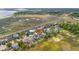 Aerial view of waterfront neighborhood with marsh views and nearby waterways at 3101 S Shore Dr, Charleston, SC 29407