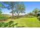 Spacious backyard featuring lush green lawn and a serene marsh view perfect for outdoor enjoyment at 3101 S Shore Dr, Charleston, SC 29407