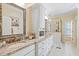 Bathroom boasting dual sinks, granite vanity, and a glass shower at 3101 S Shore Dr, Charleston, SC 29407