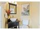 Stylish half bath with elegant vanity, mirror, lighting, and tasteful decor at 3101 S Shore Dr, Charleston, SC 29407