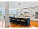Kitchen with large island provides seating and prep space in this bright open floor plan at 3101 S Shore Dr, Charleston, SC 29407
