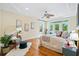Sun-drenched main bedroom includes a seating area and private access to a balcony through double doors at 3101 S Shore Dr, Charleston, SC 29407