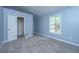 Bedroom with carpet, a window and a closet at 312 Piney Grove Rd, Cross, SC 29436
