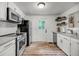 Well-lit kitchen with stainless steel appliances, sleek cabinetry, and a modern design at 3293 River Rd, Johns Island, SC 29455