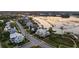 Aerial view showcases the charming neighborhood and waterway access for residents at 332 Bayley Rd, Daniel Island, SC 29492