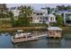Beautiful home with private dock and boat lift access to the serene waterway at 332 Bayley Rd, Daniel Island, SC 29492