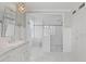 Bright bathroom featuring a double vanity, seamless glass shower, and classic finishes at 332 Bayley Rd, Daniel Island, SC 29492
