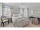 Charming bedroom with soft decor, multiple windows, and elegant furnishings at 332 Bayley Rd, Daniel Island, SC 29492