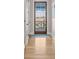 View of a lovely foyer with a wood-framed glass door that shows marsh views at 332 Bayley Rd, Daniel Island, SC 29492