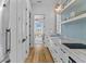 Modern kitchen with sleek countertops, stainless steel appliances, and ample cabinet space at 332 Bayley Rd, Daniel Island, SC 29492