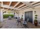 Charming outdoor patio with brick flooring, comfortable seating, and views of the surrounding landscape at 332 Bayley Rd, Daniel Island, SC 29492