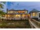 Stunning waterfront home with multiple balconies and covered outdoor living spaces at 332 Bayley Rd, Daniel Island, SC 29492