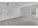 Bright bedroom with neutral carpet, a window, and a closet door at 332 Pine Crest View Dr, Summerville, SC 29486