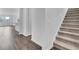 Inviting entryway showcasing hardwood floors, staircase, and open-concept layout at 332 Pine Crest View Dr, Summerville, SC 29486
