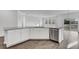 Kitchen island featuring white cabinets, granite countertops, and a stainless steel dishwasher at 332 Pine Crest View Dr, Summerville, SC 29486