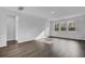 Bright, open living room with hardwood floors and large windows at 332 Pine Crest View Dr, Summerville, SC 29486