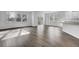 Open-concept living area with hardwood floors, natural light, and seamless flow to kitchen at 332 Pine Crest View Dr, Summerville, SC 29486