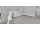 A well-lit loft area features neutral carpet, recessed lighting, and versatile space at 332 Pine Crest View Dr, Summerville, SC 29486