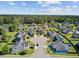 Aerial view showcases a well-planned community with single-Gathering homes and landscaped yards at 3801 Canary Ct, North Charleston, SC 29420