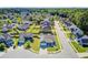 Overhead view of the home nestled in a community with lush greenery and mature trees at 3801 Canary Ct, North Charleston, SC 29420