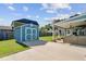 Spacious backyard featuring a shed, covered patio, and well-maintained lawn at 3801 Canary Ct, North Charleston, SC 29420