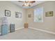 Cozy bedroom with neutral walls, window and a ceiling fan at 3801 Canary Ct, North Charleston, SC 29420