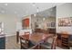Open concept dining area flowing into the living room with modern decor at 3801 Canary Ct, North Charleston, SC 29420