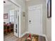 Welcoming entryway with a white door and sidelights, opening to an office space with French doors at 3801 Canary Ct, North Charleston, SC 29420