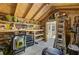 Organized garage space featuring shelving, power tools, and ample storage at 3801 Canary Ct, North Charleston, SC 29420