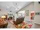 Spacious living room with a vaulted ceiling, leather furniture, and an open layout at 3801 Canary Ct, North Charleston, SC 29420