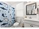 bathroom featuring a toilet, sink and a shower with decorative curtain at 383 Oak Park St, Summerville, SC 29486