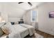 Bedroom with natural lighting, hardwood floors, and sloped ceilings at 383 Oak Park St, Summerville, SC 29486